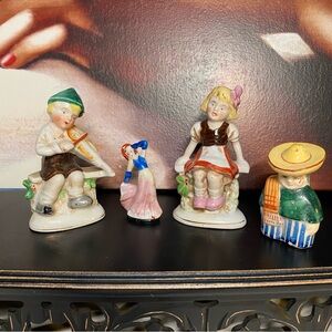 Family of 4 from Made in Occupied Japan.